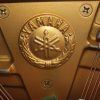 Yamaha U3A Upright piano, reconditioned, Inside Yamaha logo close up