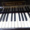 Challen antique baby grand piano keyboard close up