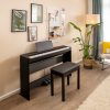 Yamaha P-145 with bench in a room